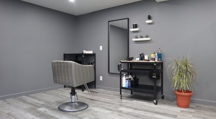 Modern hair salon chair and tools at The Spot, Montréal, Québec, CA offering a stylish ambience for beauty treatments.