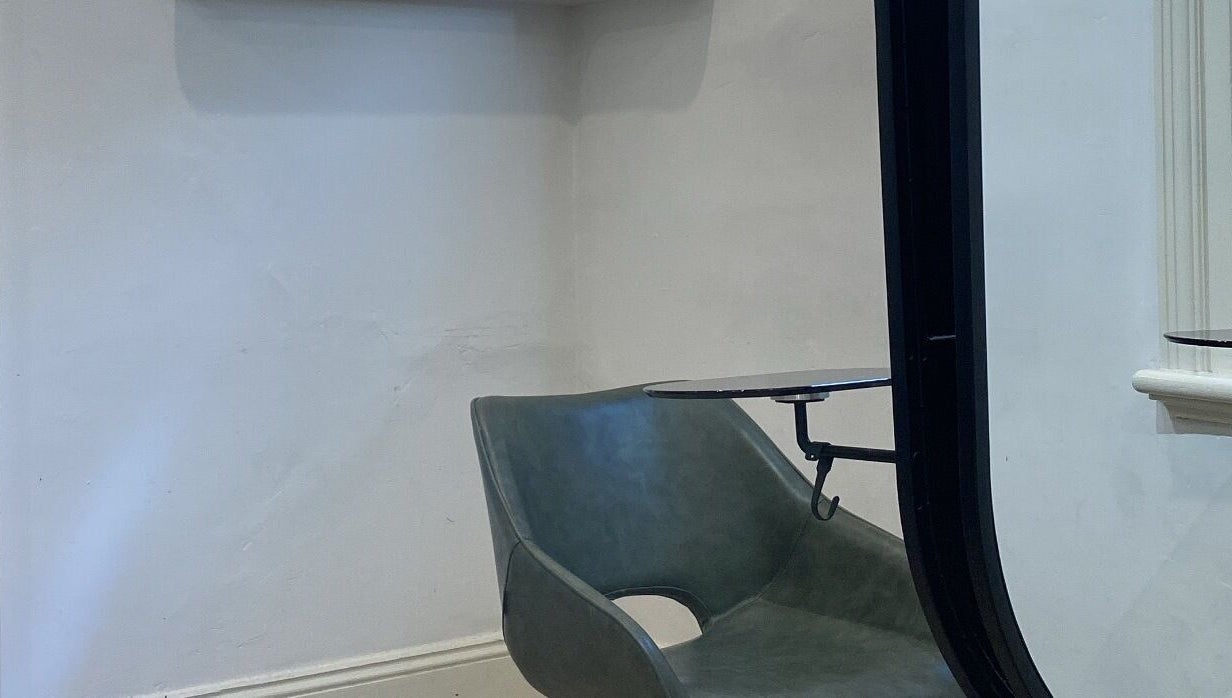 Cozy seating area at Hair by Bree, Camden, New South Wales, AU with modern decor.
