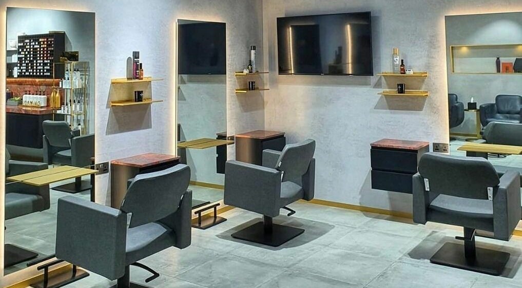 Modern salon interior at Samarz Beauty Lounge - Sobha Hartland Greens, Dubai, Dubai, AE featuring chic styling chairs.