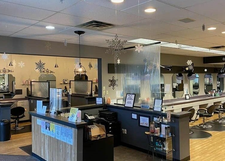 Interior of Changes Hair Design in Meridian Charter Township, Michigan, US, showcasing modern salon stations.