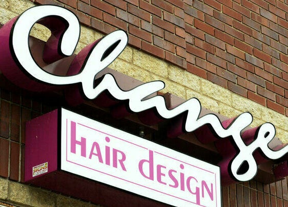 Exterior sign of Changes Hair Design in Meridian Charter Township, Michigan, US.