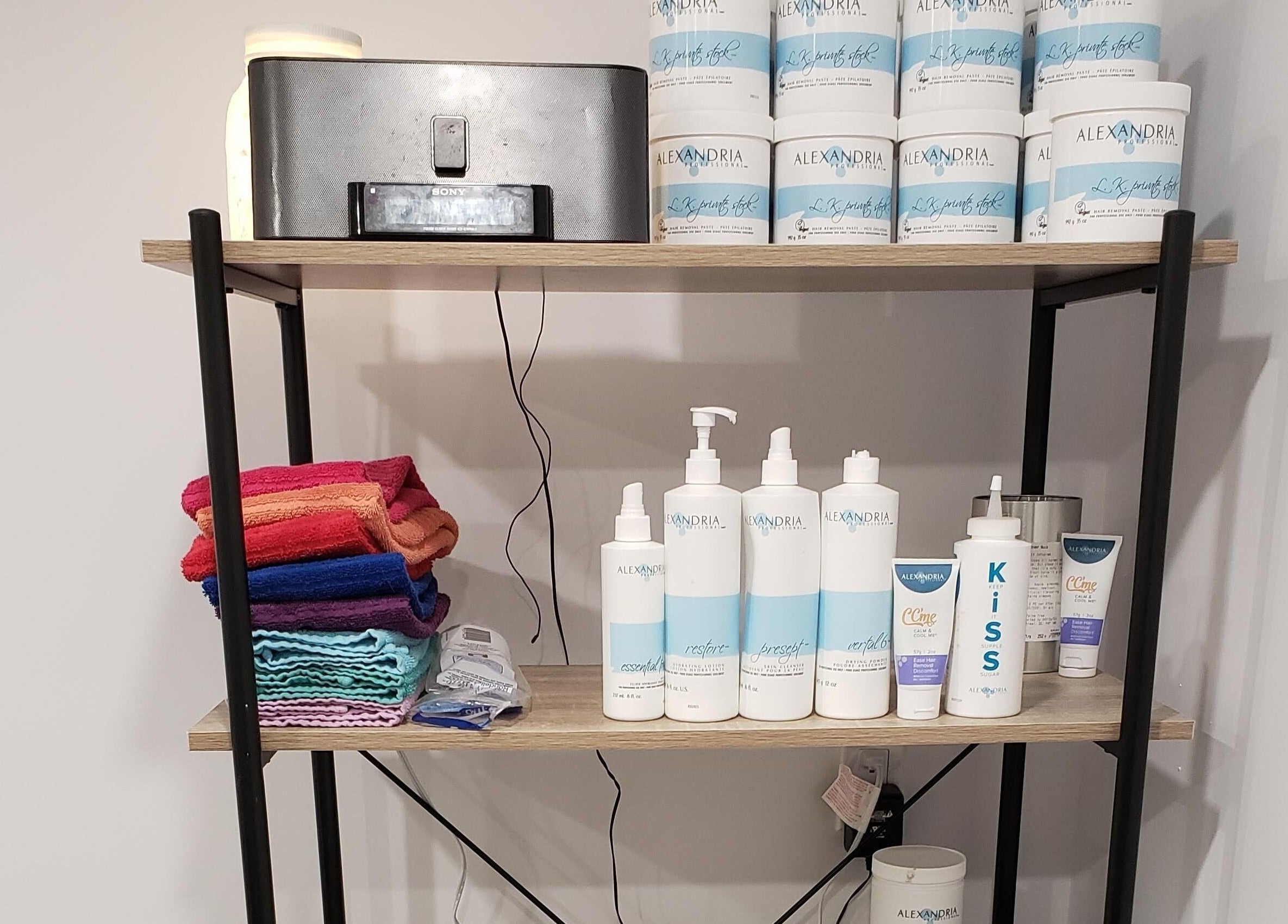Beauty products and towels at The Sugary in Peterborough, Ontario, CA improve relaxation and aesthetics.