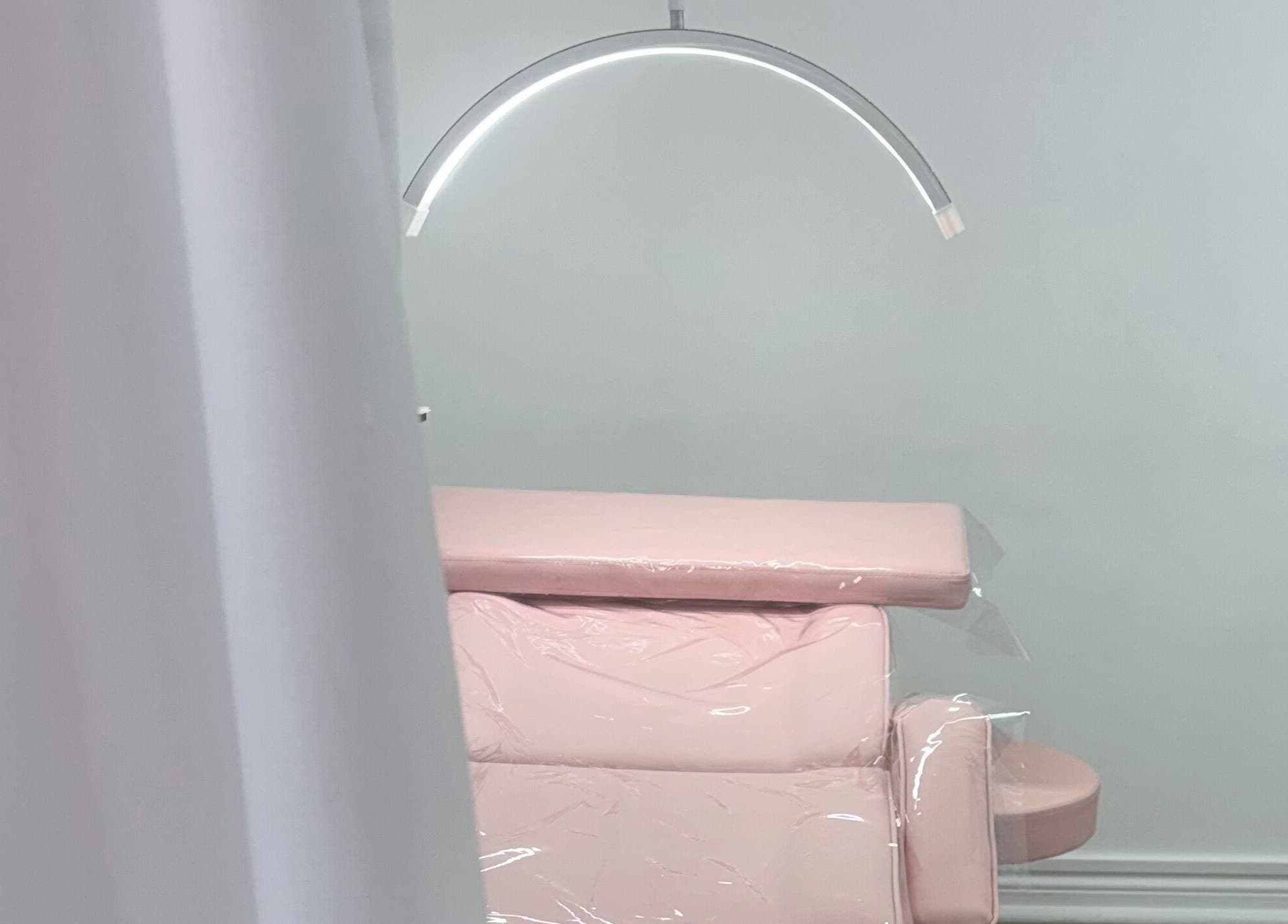 Elegant pink salon chair at So-Phine Lashes in Capalaba, Queensland, AU, creating a luxurious beauty space.