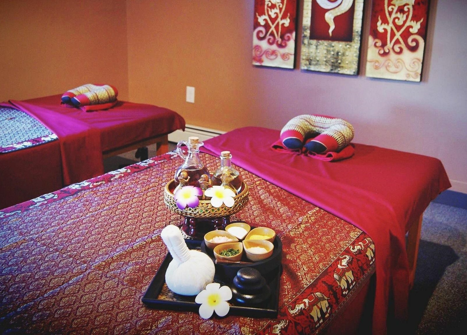 Thai Villa Spa in Newton, Massachusetts, US offers a tranquil massage room with calming decor.
