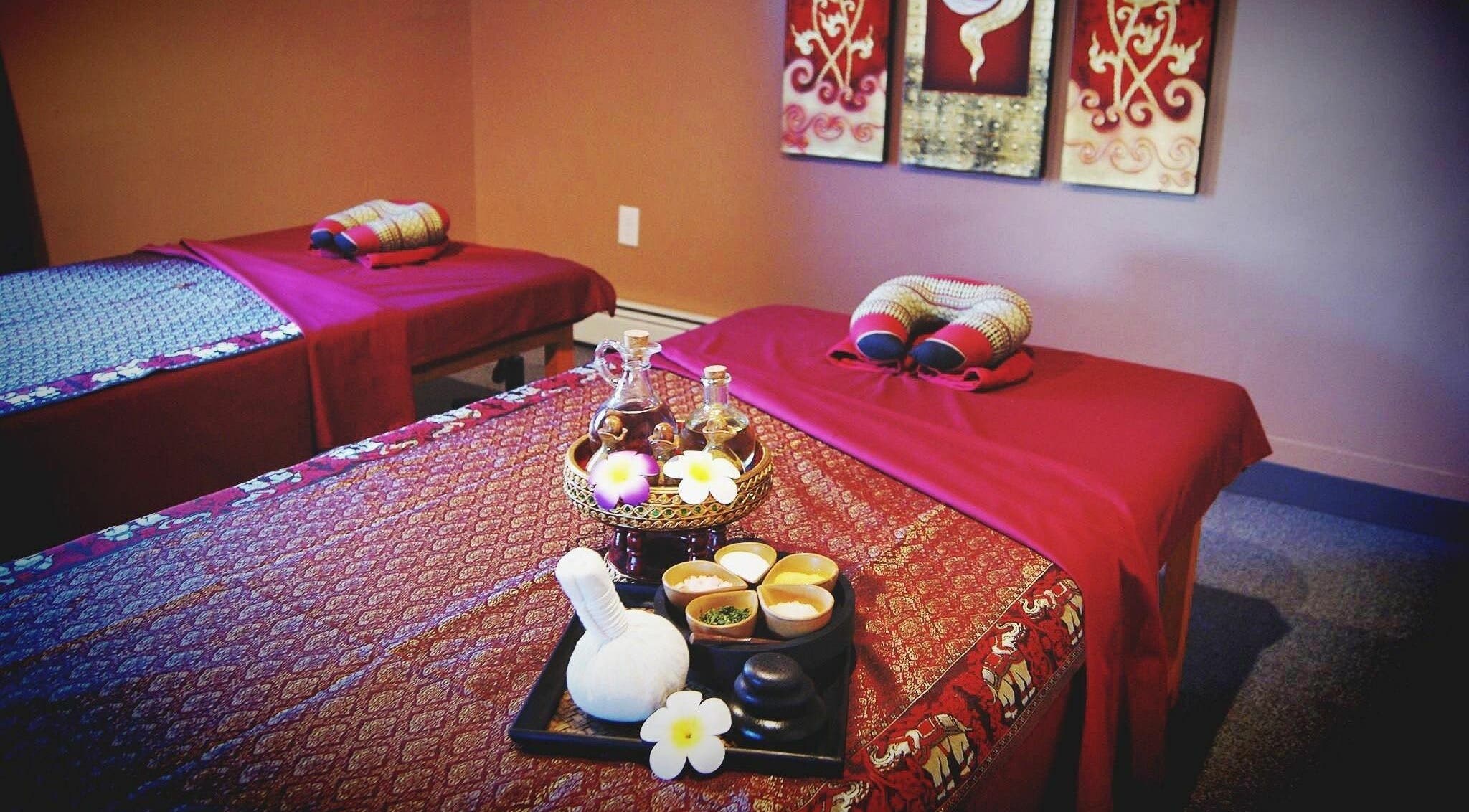 Thai Villa Spa in Newton, Massachusetts, US offers a tranquil massage room with calming decor.
