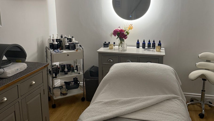 Relaxing treatment room at The Norfolk Beauty Rooms, North Walsham, England, GB with cozy decor and spa products.