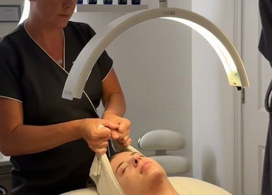 Facial treatment at The Norfolk Beauty Rooms, North Walsham, England, GB, under soft lighting.