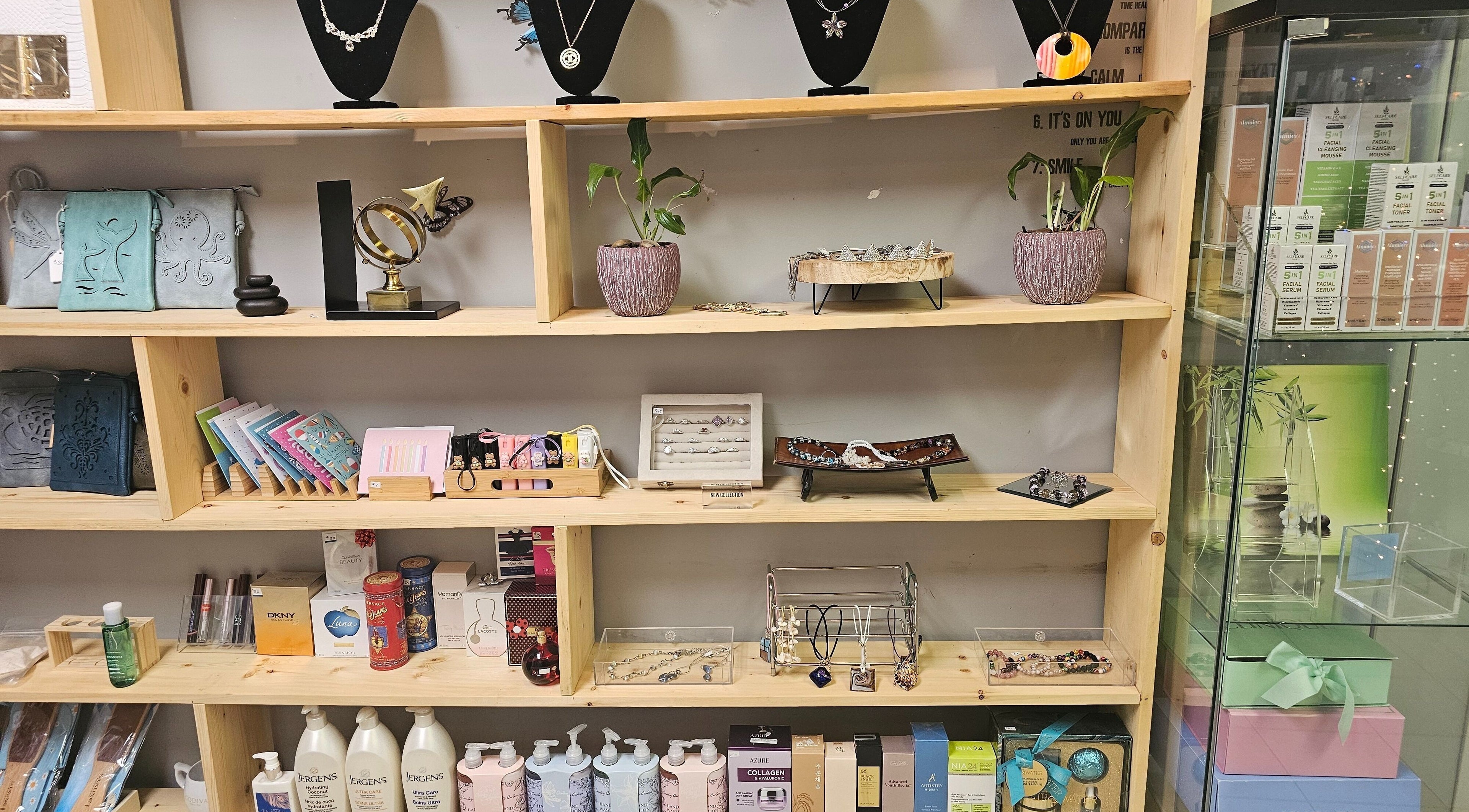 HoangLinh Spa's product display, Mission, British Columbia, CA showcasing jewelry and skincare.