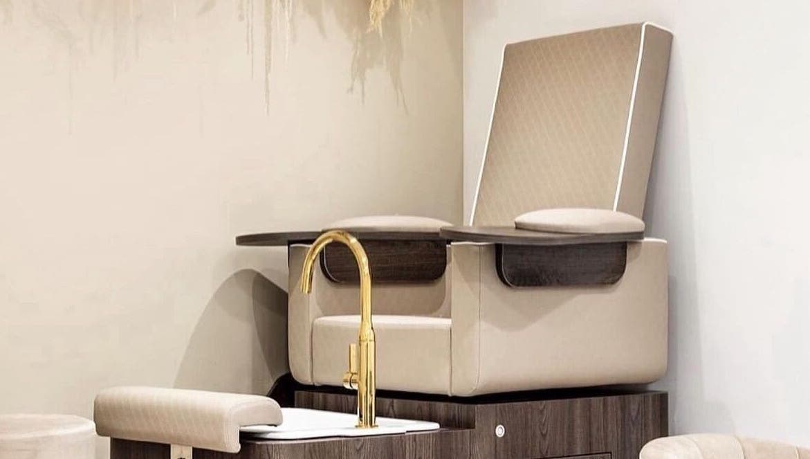 Elegant pedicure chair at Genesis Skin & Beauty in Barrow, England, GB, showcasing a luxurious spa experience.
