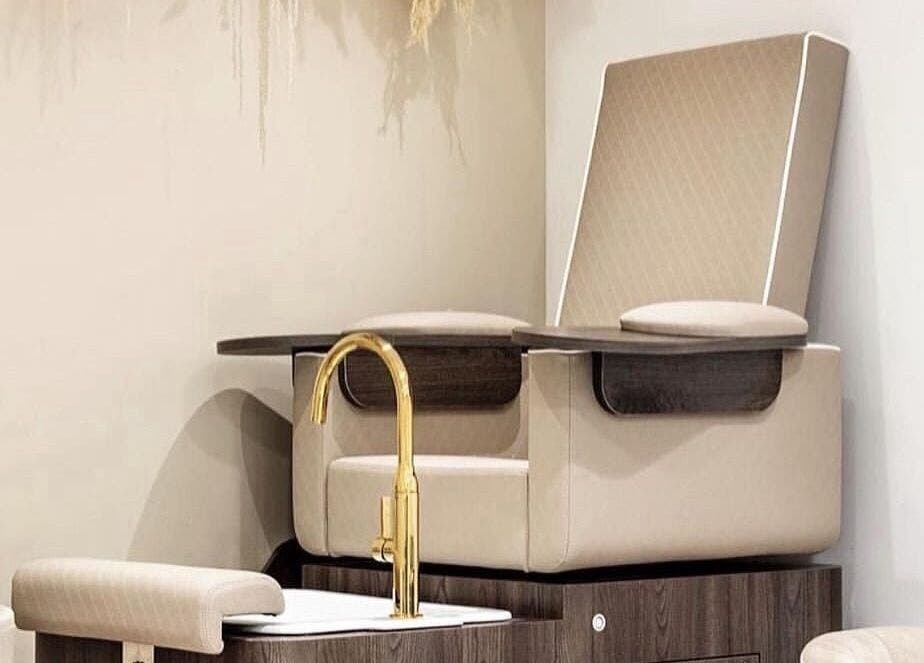 Elegant pedicure chair at Genesis Skin & Beauty in Barrow, England, GB, showcasing a luxurious spa experience.