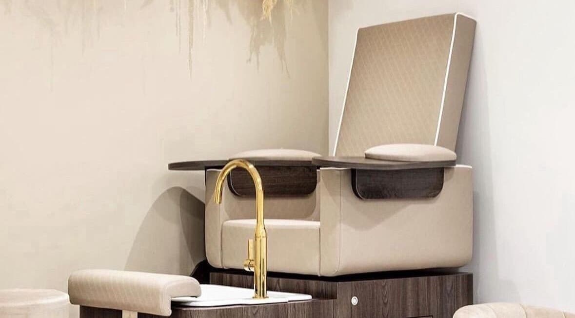 Elegant pedicure chair at Genesis Skin & Beauty in Barrow, England, GB, showcasing a luxurious spa experience.