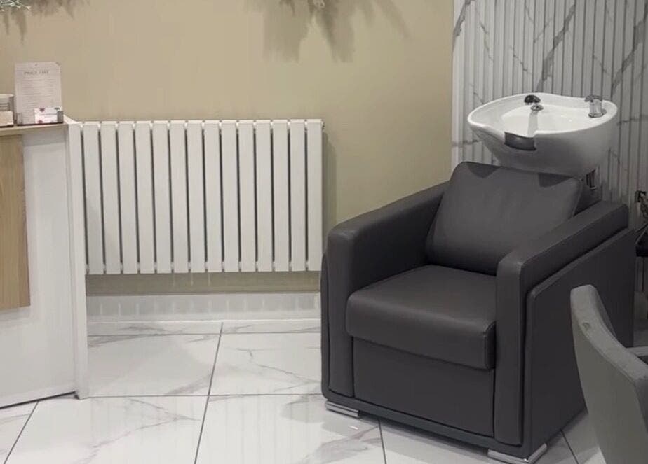 Elegant salon wash station at Genesis Skin & Beauty in Barrow, England, GB, offering luxury hair treatments.