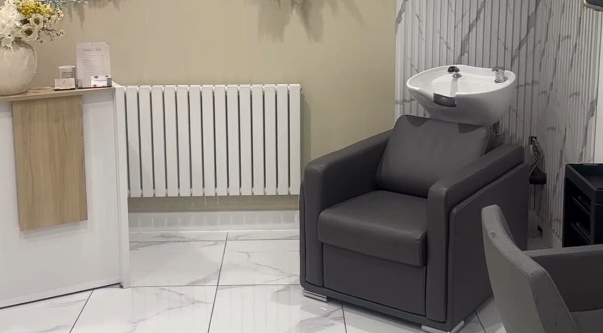 Elegant salon wash station at Genesis Skin & Beauty in Barrow, England, GB, offering luxury hair treatments.