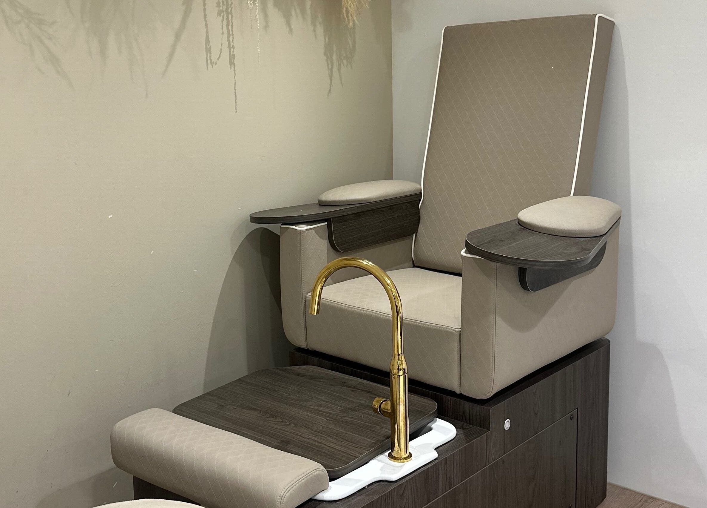 Elegant pedicure chair at Genesis Skin & Beauty, Barrow, England, GB, offering a luxurious spa experience.