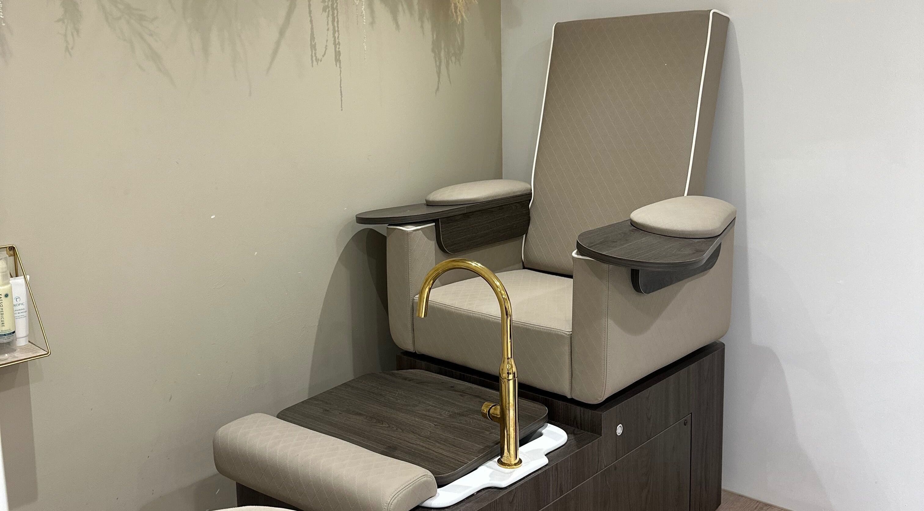 Elegant pedicure chair at Genesis Skin & Beauty, Barrow, England, GB, offering a luxurious spa experience.