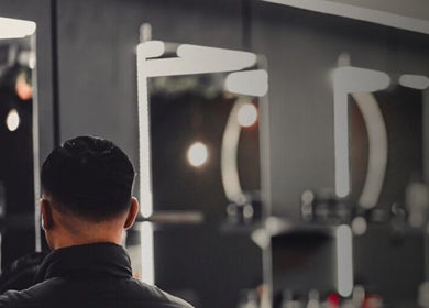 Modern salon interior at Prep Beauty Lounge in Paarl, Western Cape, ZA with elegant mirrors and ambient lighting.