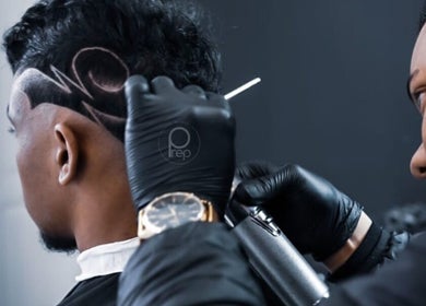 Intricate haircut design at Prep Beauty Lounge, Paarl, Western Cape, ZA, showcasing skilled barber art.