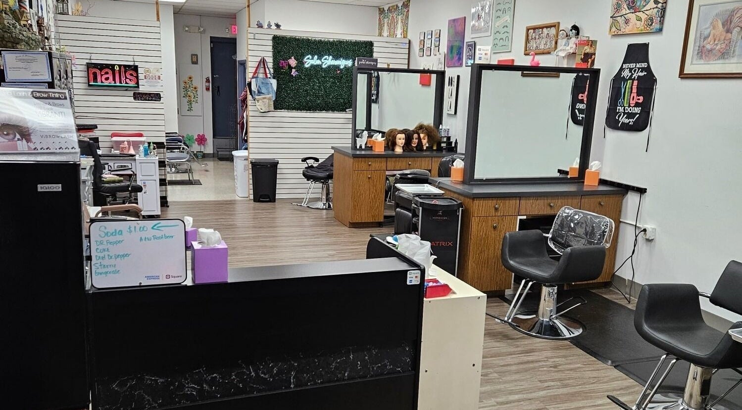 Interior of Salon Shenanigans LLC with styling stations in St. Louis, Missouri, US.