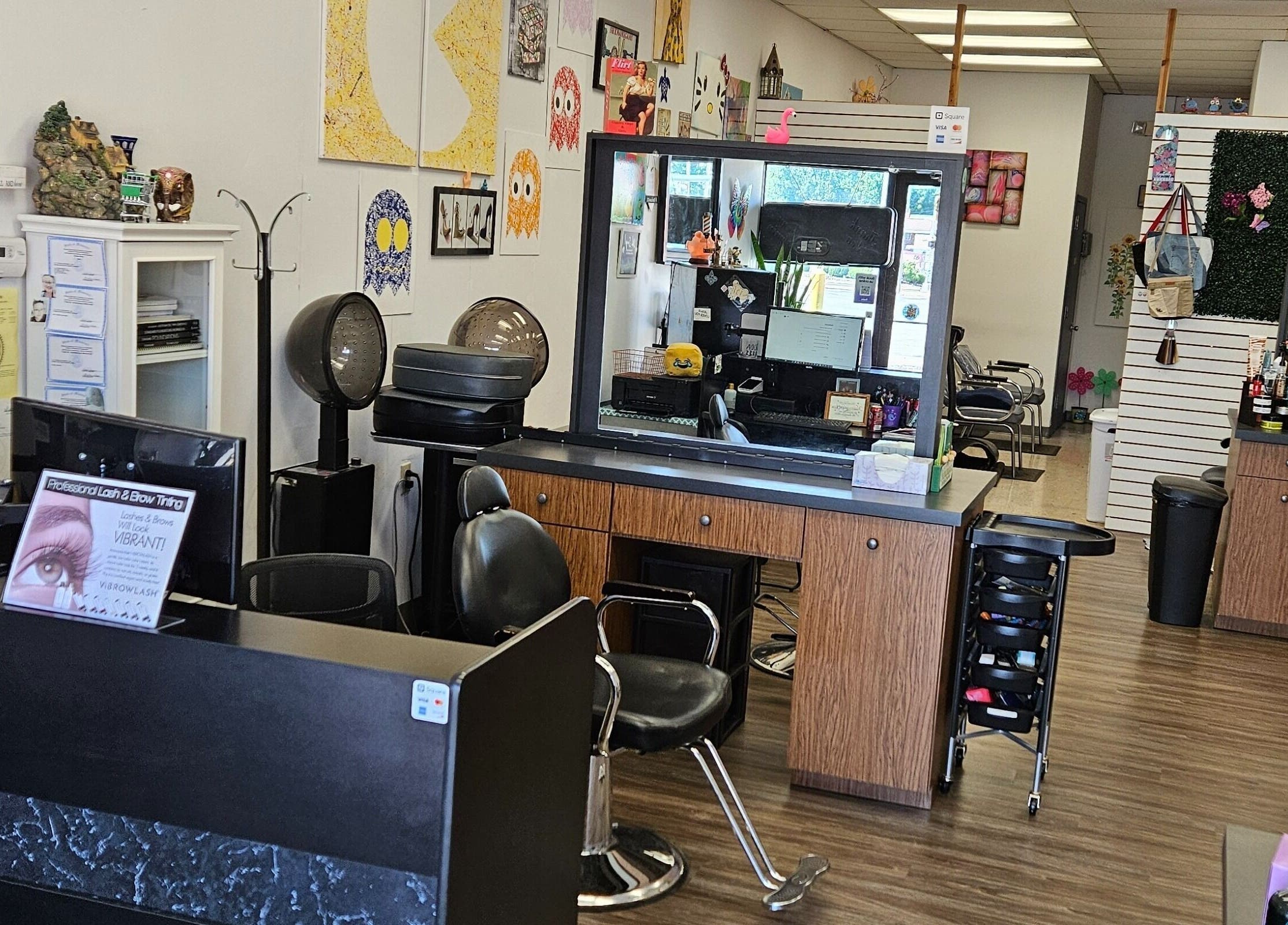Inviting interior of Salon Shenanigans LLC, St. Louis, Missouri, US, showcasing modern styling stations.