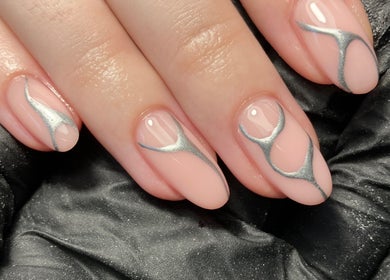 Elegant silver-accented nails at Rebecca Davies Beauty, Kenfig Hill, Wales, GB.