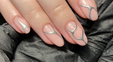 Elegant silver-accented nails at Rebecca Davies Beauty, Kenfig Hill, Wales, GB.