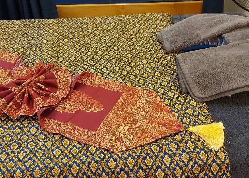 Elegant massage bed setup at Lotus Thai Massage Warwick, QLD, Warwick, Queensland, AU.