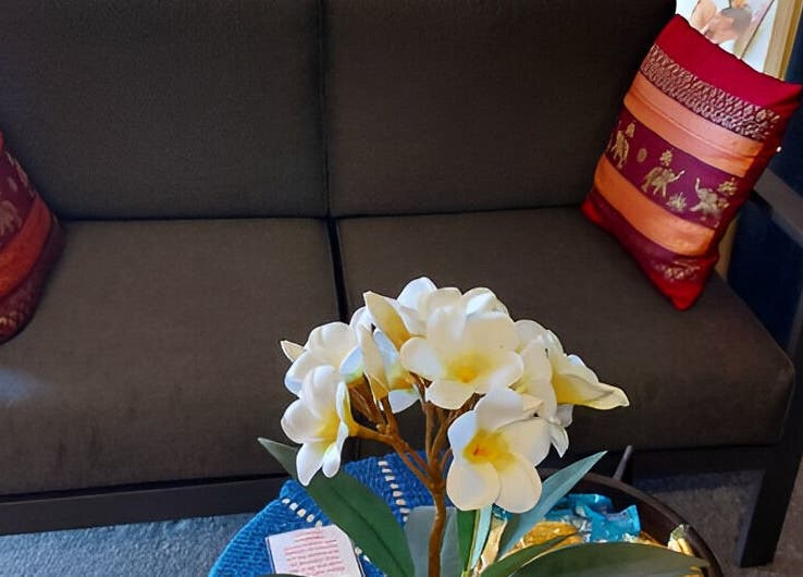 Comfortable seating and floral decor at Lotus Thai Massage Warwick, QLD, Warwick, Queensland, AU.