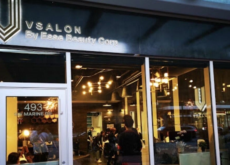 Exterior of Vsalon in Vancouver, British Columbia, CA with contemporary design and inviting lighting.