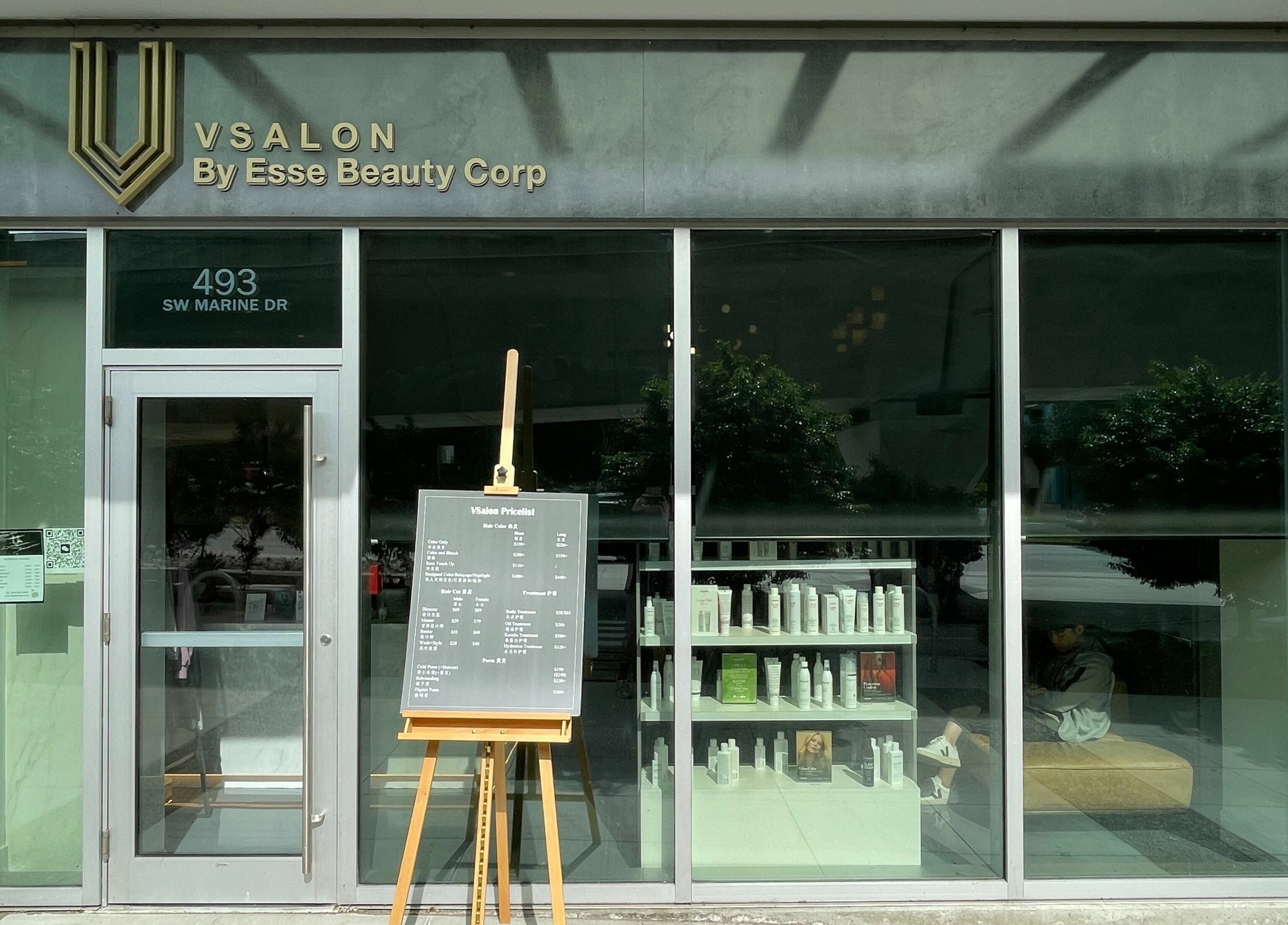 Vsalon storefront in Vancouver, British Columbia, CA featuring services menu and product display.