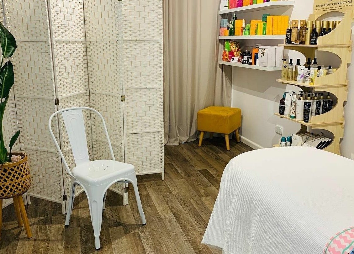 Relaxing spa room at Meditate and Exfoliate, Ourimbah, New South Wales, AU with modern decor and beauty products.