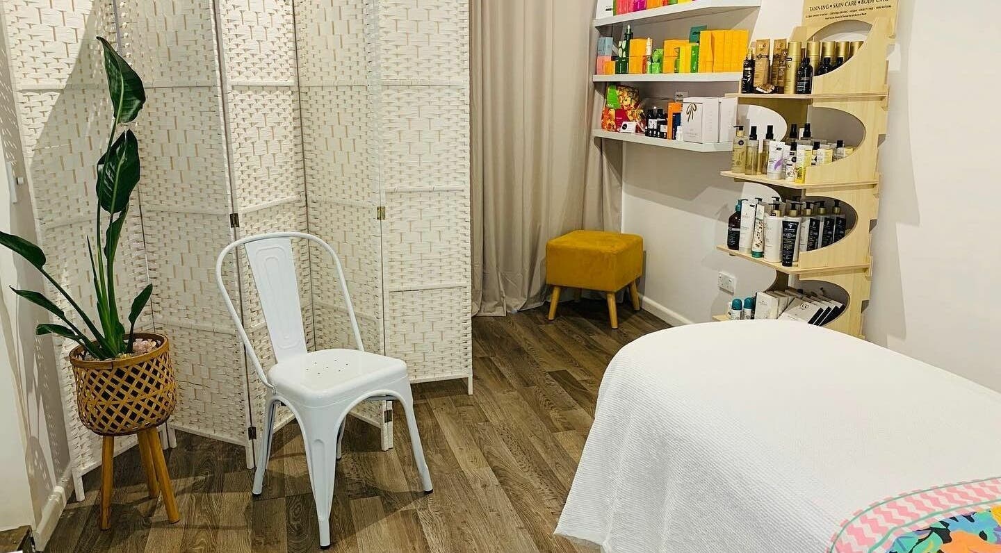 Relaxing spa room at Meditate and Exfoliate, Ourimbah, New South Wales, AU with modern decor and beauty products.