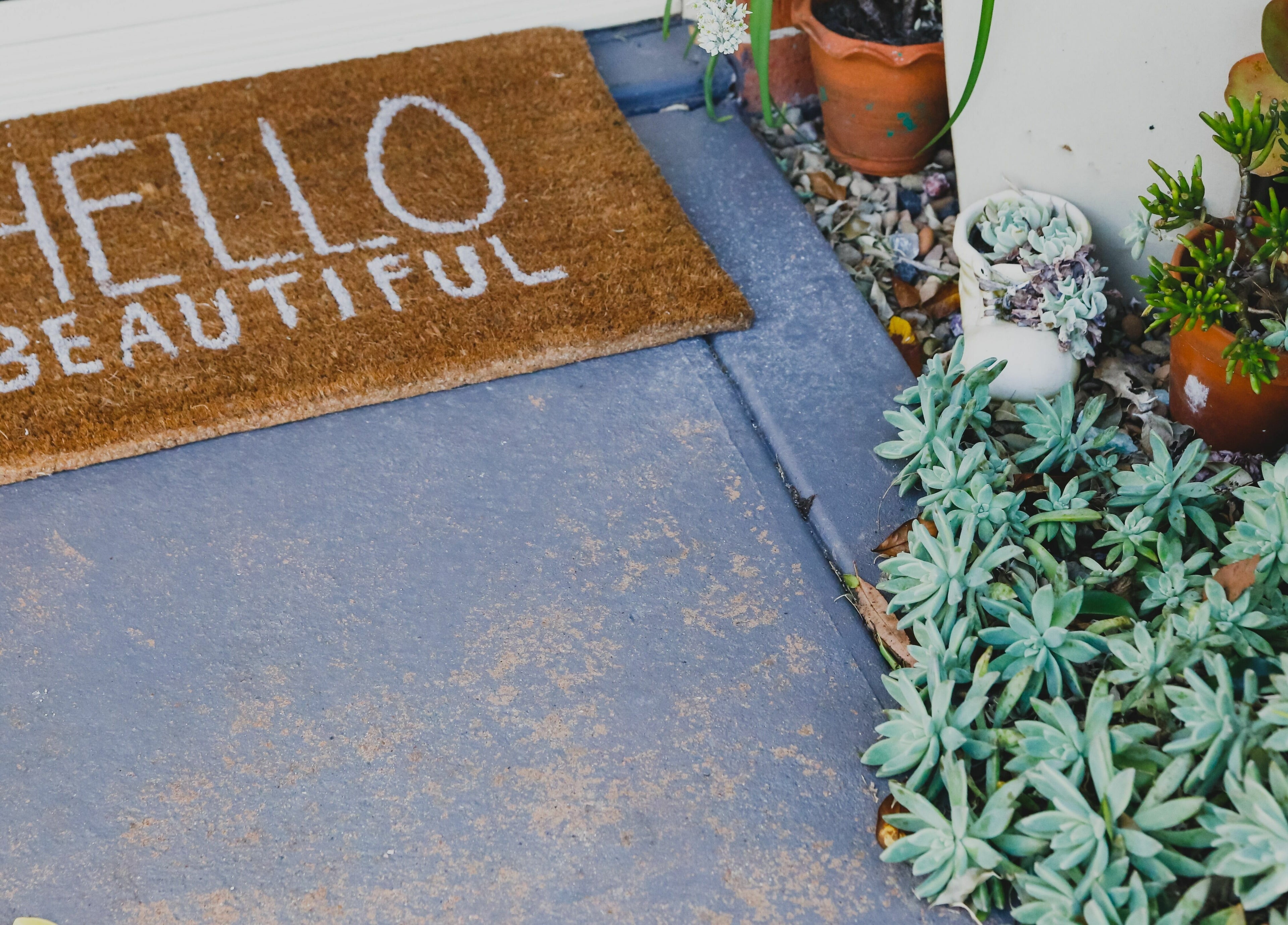 Welcome mat and succulent garden at Meditate and Exfoliate, Ourimbah, New South Wales, AU.