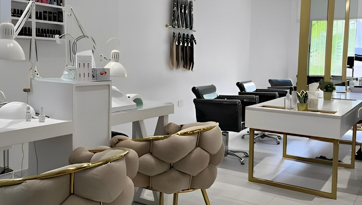 Modern interior of The Muse Salon in Manama, Muḥāfaẓat al-ʿĀṣimah, BH showcasing stylish chairs and workstations.