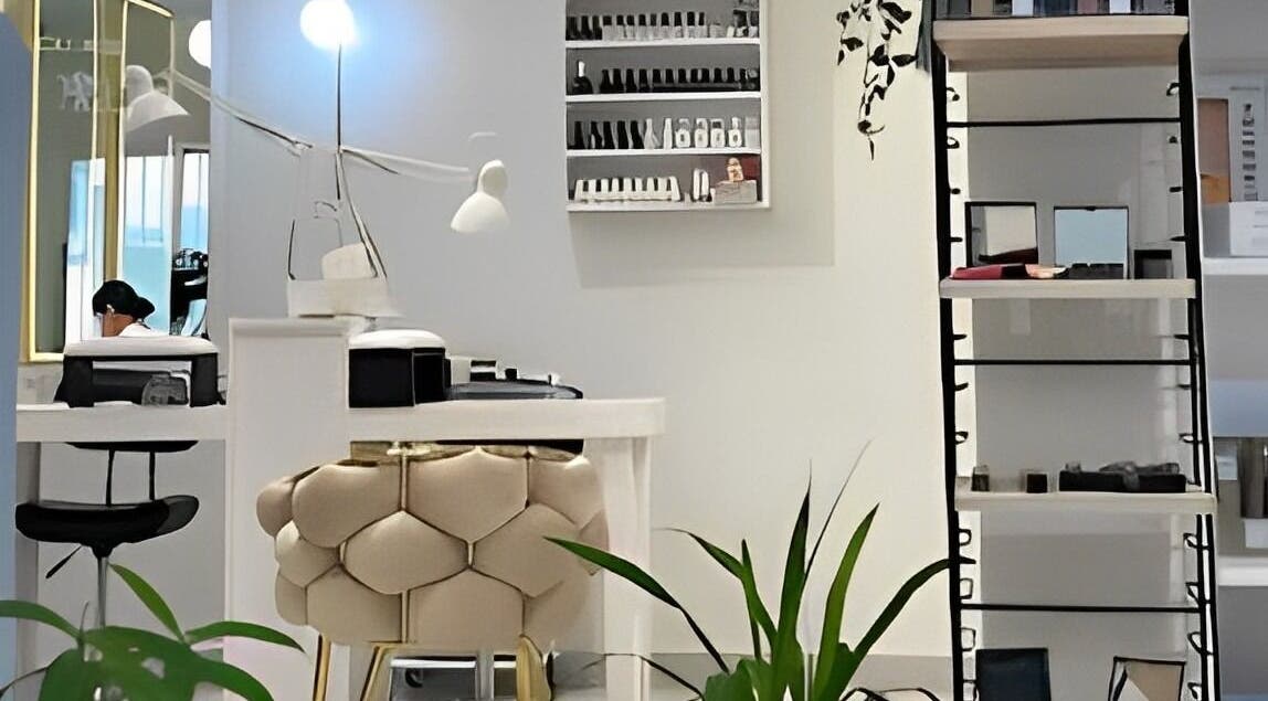 Modern interior of The Muse Salon, Manama, Muḥāfaẓat al-ʿĀṣimah, BH showcasing sleek design and beauty products.