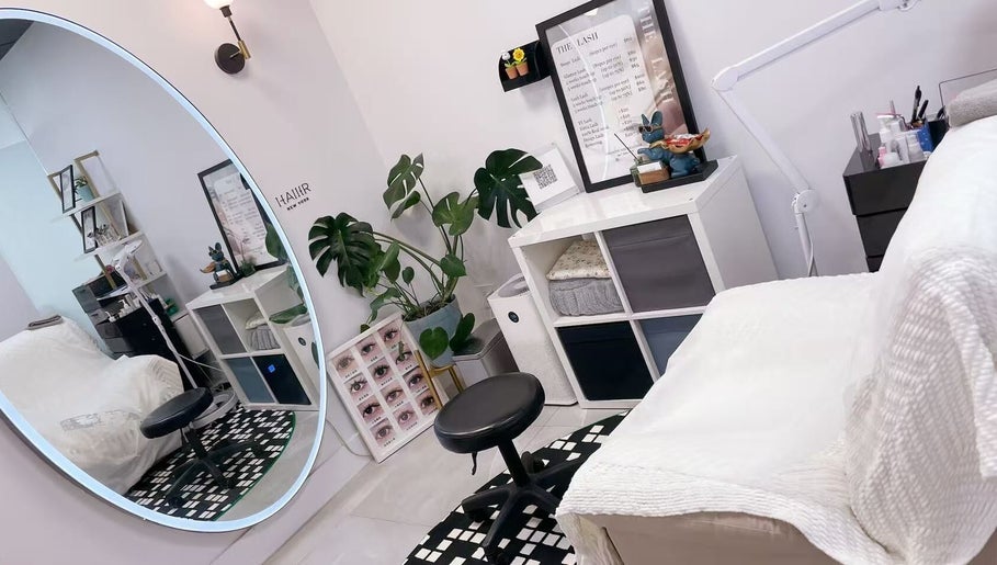 Modern beauty treatment room at New York - Freelance, New York, US with elegant decor and lush greenery.