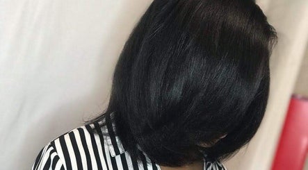 Stylish bob haircut at Beautiful Touch by Tiffany Hair Salon, Shelby Township, Michigan, US.