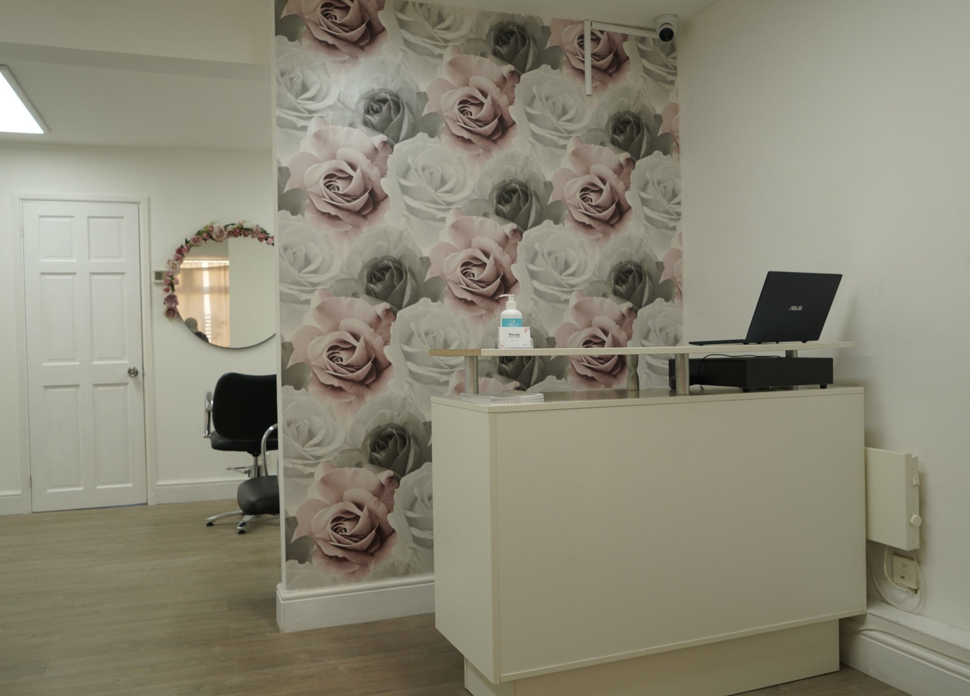 Reception area with floral decor at Precise, Southampton, England, GB.