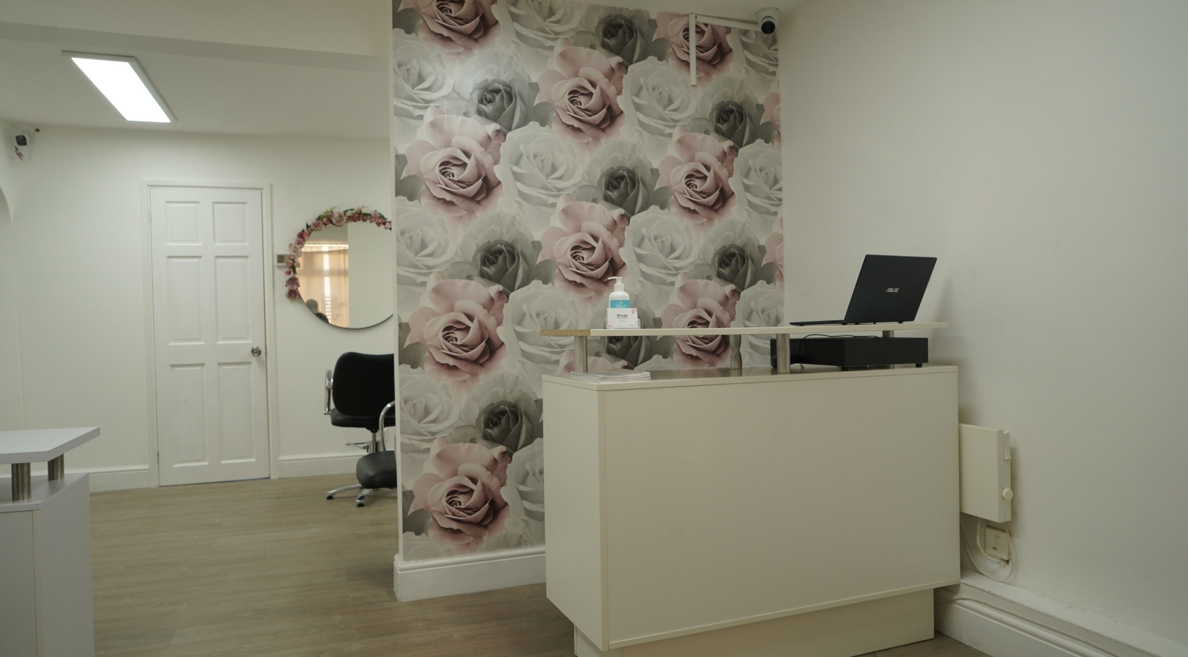 Reception area with floral decor at Precise, Southampton, England, GB.