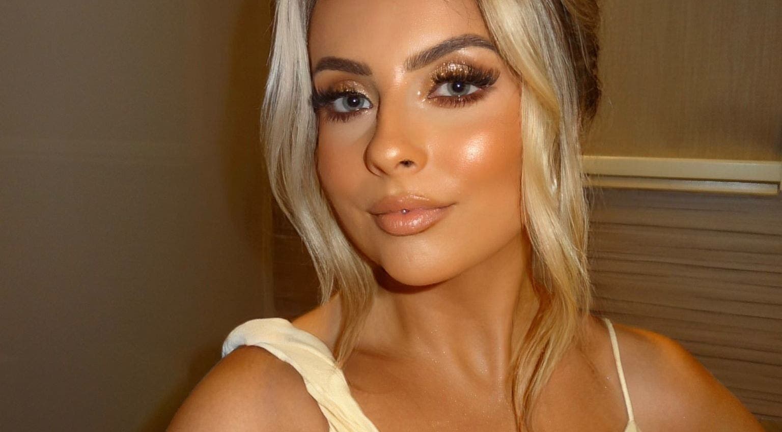 Beautiful makeup look by Makeup by Daisy in Widley, England, highlighting shimmering eye shadows.