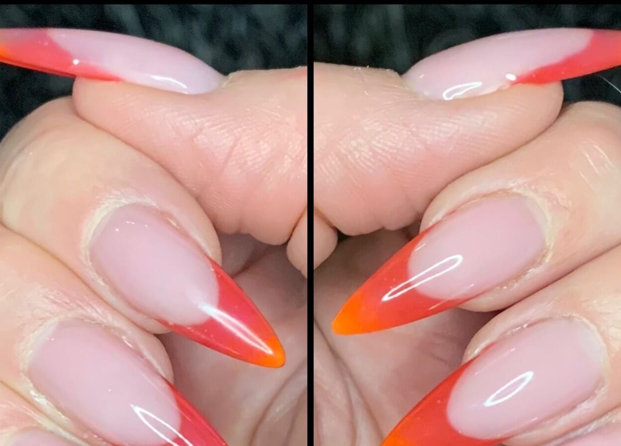 Fiery gradient nail design at Got Nails, Harlow, England, GB. Stunning acrylic art in vibrant shades.