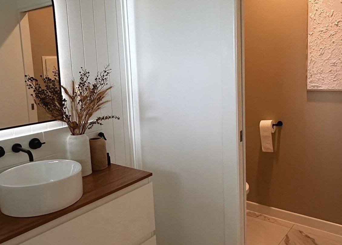 Luxurious bathroom at Beauté by Janita, Kiels Mountain, Queensland, AU. Modern sink and decor.