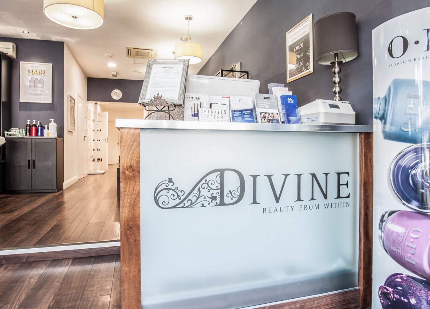 Divine London Clinic reception with modern decor in Northwood, England, GB. Welcoming beauty and wellness space.
