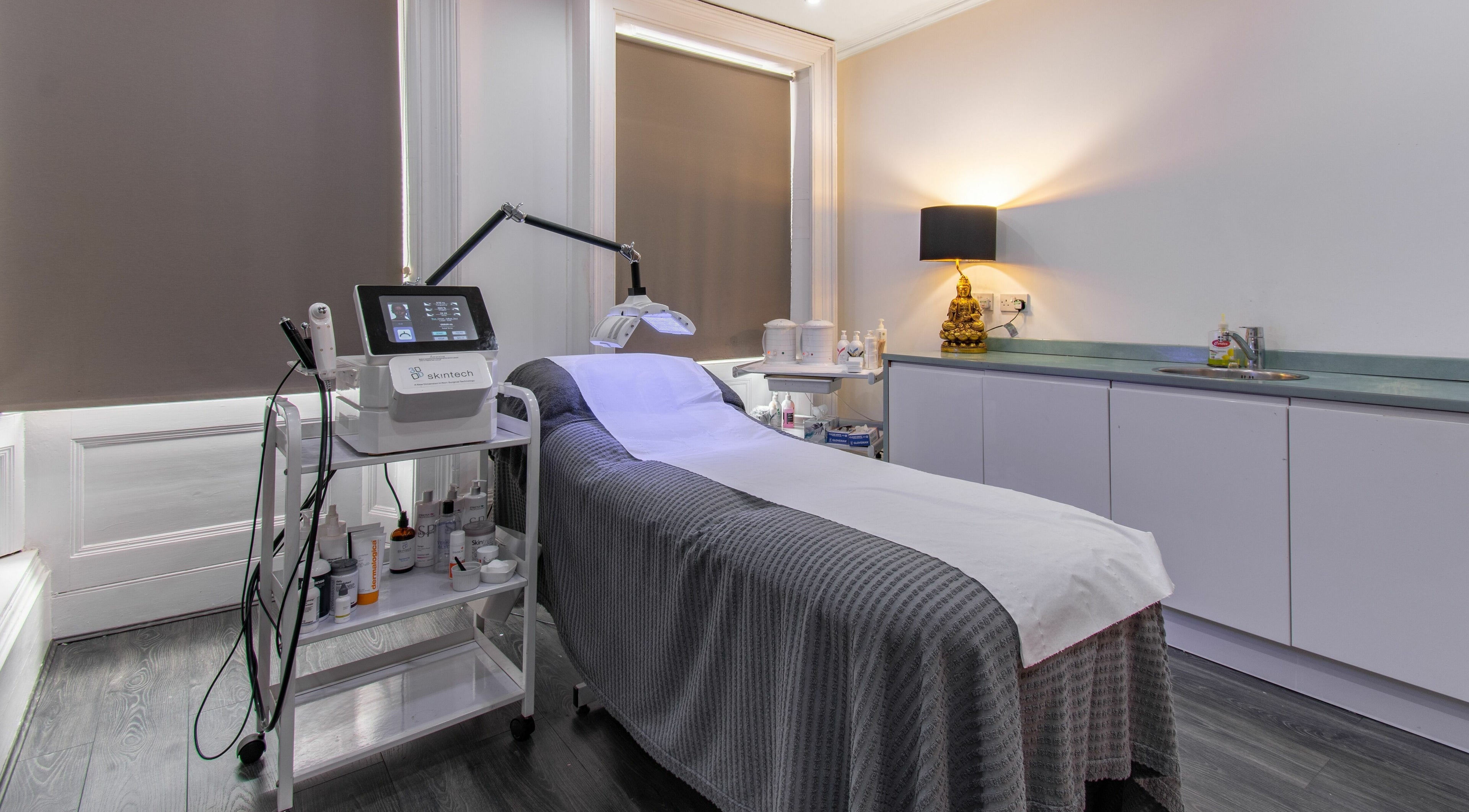 Serene treatment room at Love U Tanning & Beauty, Uxbridge, England, GB, showcasing modern equipment and comfort.