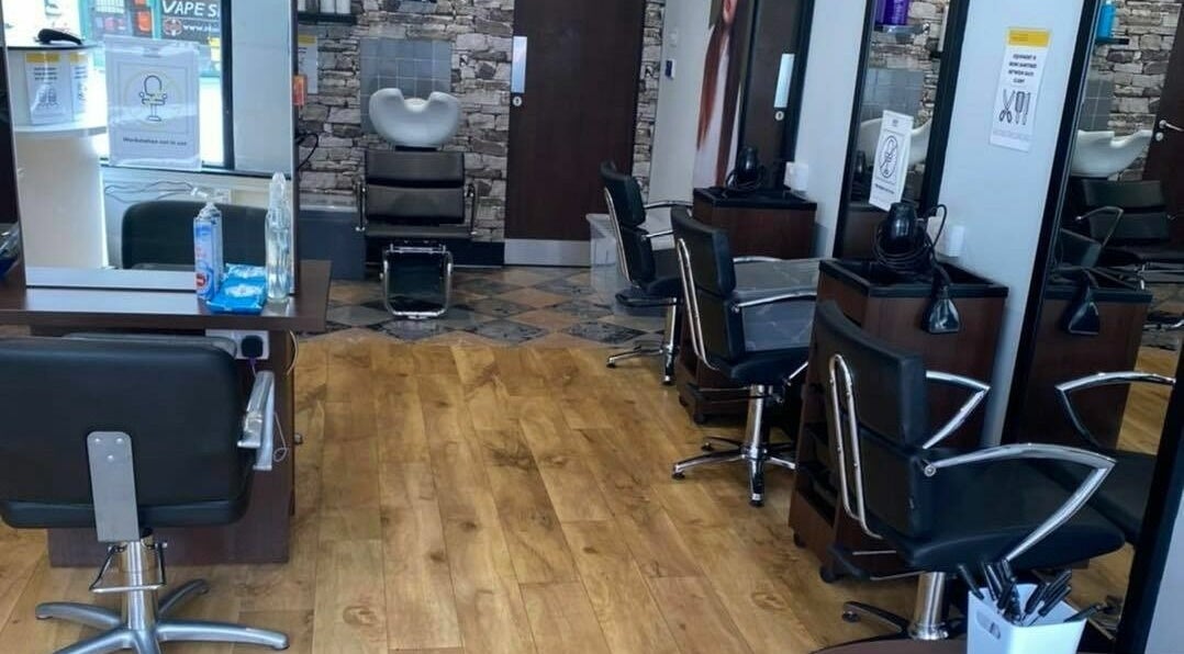 Modern interior of J F H Design, spa venue in Inverness, Scotland, GB, with stylish chairs and mirrors.