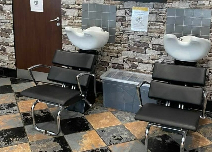 Modern salon wash stations at J F H Design, Inverness, Scotland, GB with sleek chairs and stylish decor.