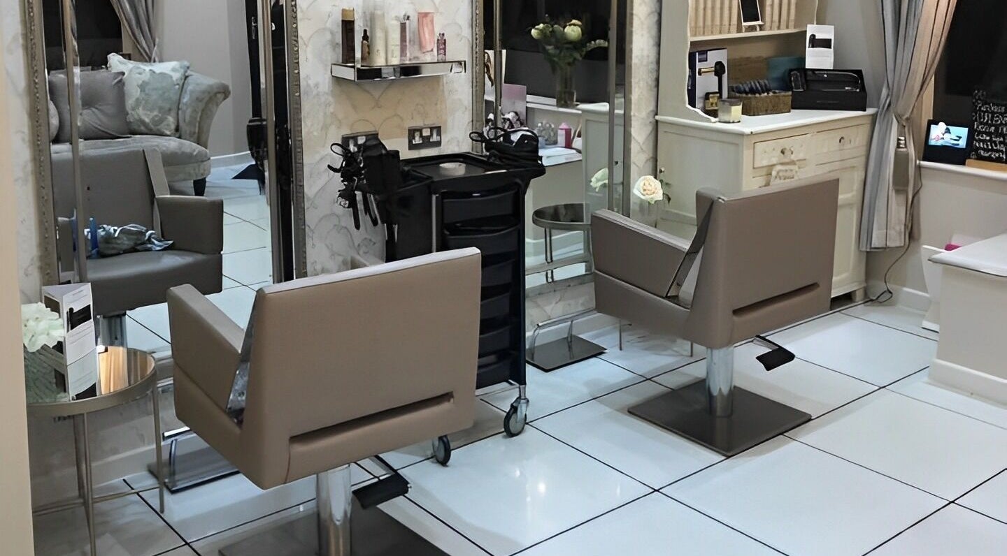 Modern salon chairs and decor at Brooks Hair & Beauty in Clayton, England, GB. A spacious beauty setting.