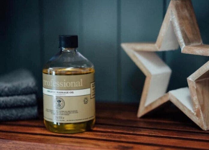 Massage oil and star decor at The Barn Beauty Rooms, Norwich, England, GB, enhancing wellness ambiance.