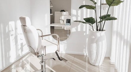 Bright salon chair and plants at Tomeeka Jay Beauty Collective, Buronga, New South Wales, AU.