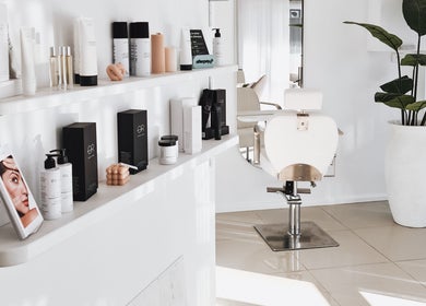 Modern salon interior at Tomeeka Jay Beauty Collective in Buronga, New South Wales, AU featuring product displays.