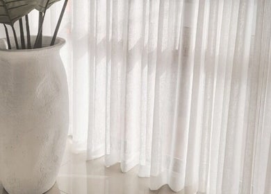 Elegant vase with leaves at Tomeeka Jay Beauty Collective, Buronga, New South Wales, AU.